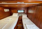 A luxury gulet cabin with twin beds
